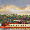 A picture of a beautiful Dhabaya in the Nile River with some natural trees as a background